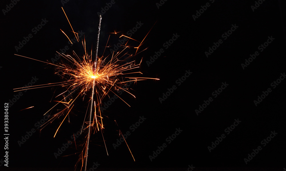 Glowing sparkler celebration by night