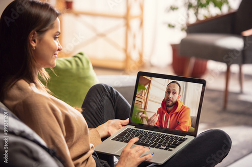 Free Download Celebration and holidays during quarantine concept. Friends or family unpacking gifts while talking using video call. Look happy, cheerful, sincere. Concept of New Year, technologies, emotions. - GFXLoad