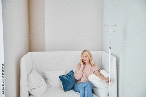 Woman undergoing intravenous vitamin therapy in a wellness center