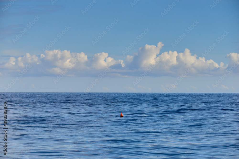 an anchor buoy in the middle of the sea