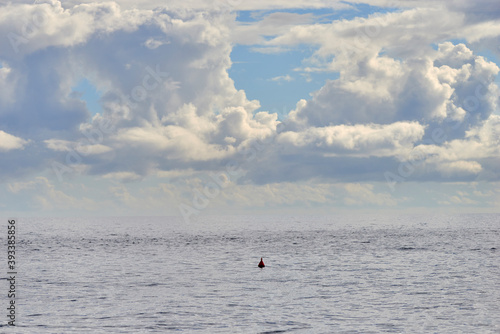an anchor buoy in the middle of the sea