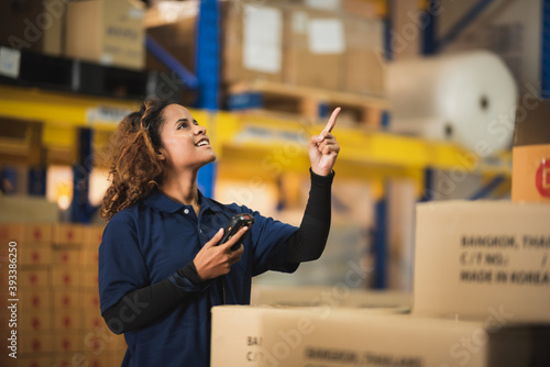 warehouse worker using bar ...