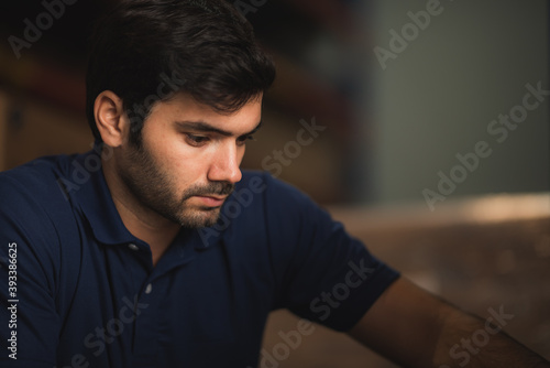 Portrait of a foreman in an international warehouse storage space, concept of business, logistics and online marketing