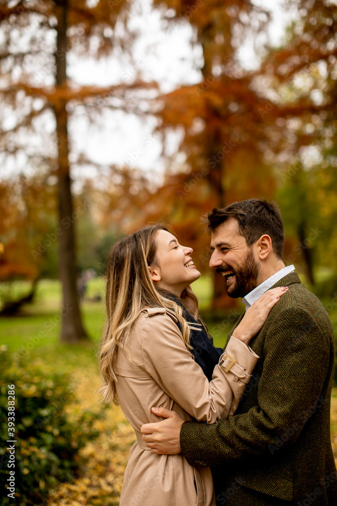 Young couple walking in the autumn park Young couple walking in the autumn park
