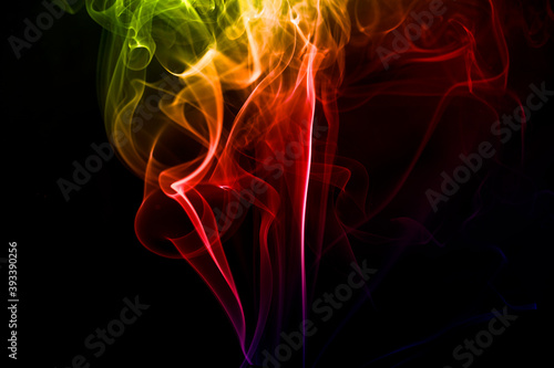Close-Up colorful Smoke over black background for overlay design