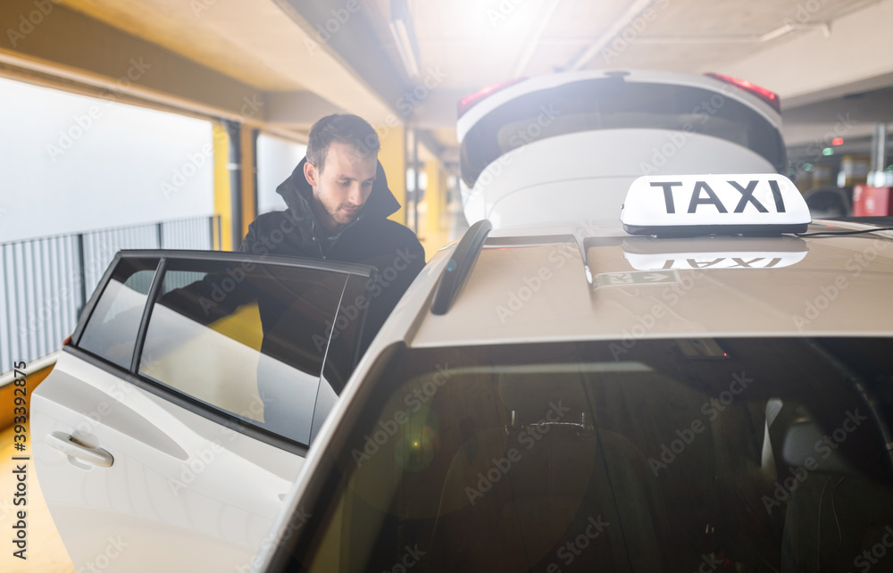 taxi car - pick-up from the airport - entrance to the taxi