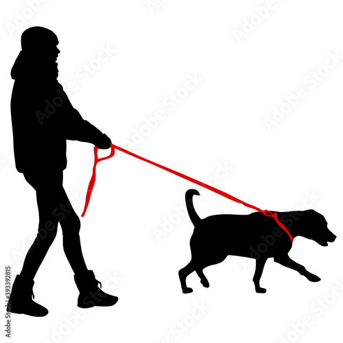 Silhouette of woman and dog on a white background
