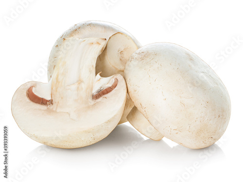 Fresh champignon mushrooms isolated on white background.