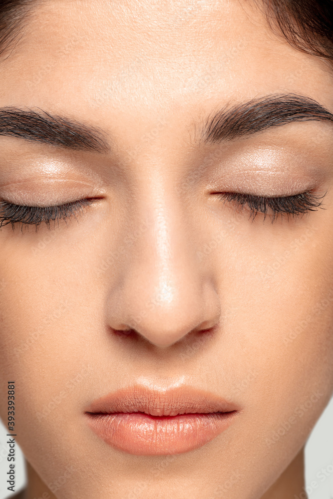 Young face. Close up portrait of beautiful jewish female model. Parts of face and body. Beauty, fashion, skincare, cosmetics, wellness concept. Well-kept skin aesthetic, fresh look, details. Young face. Close up portrait of beautiful jewish female model. Parts of face and body. Beauty, fashion, skincare, cosmetics, wellness concept. Well-kept skin aesthetic, fresh look, details.