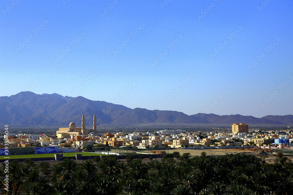 View of the palm grove and the city of Nakhal, Al Batinah Region of Oman