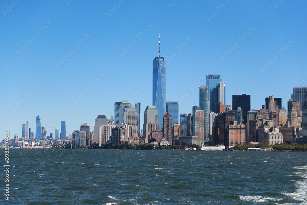 Obraz premium A view of One World Trade Center and lower Manhattan are seen on board the Staten Island Ferry.
