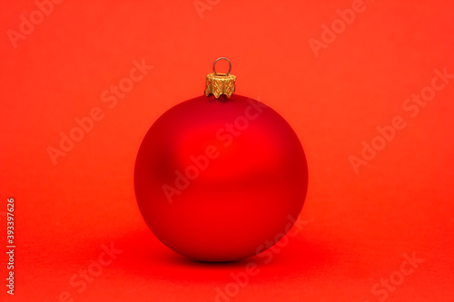 Isolated new year or christmas toy on red background copyspace