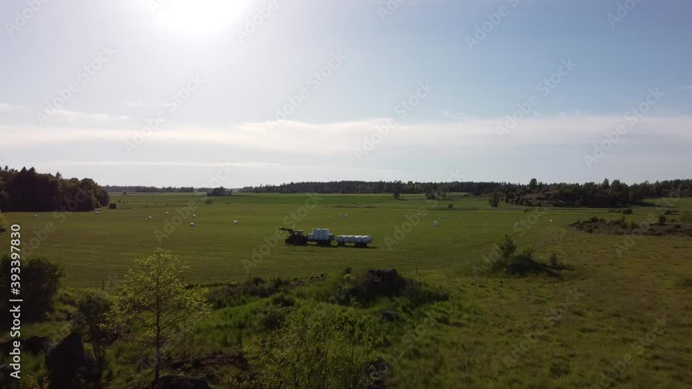 Aerial view of fields and a tractor Aerial view of fields and a tractor