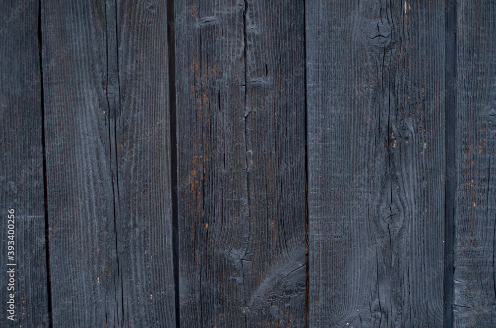 New black painted wooden wall close New black painted wooden wall close
