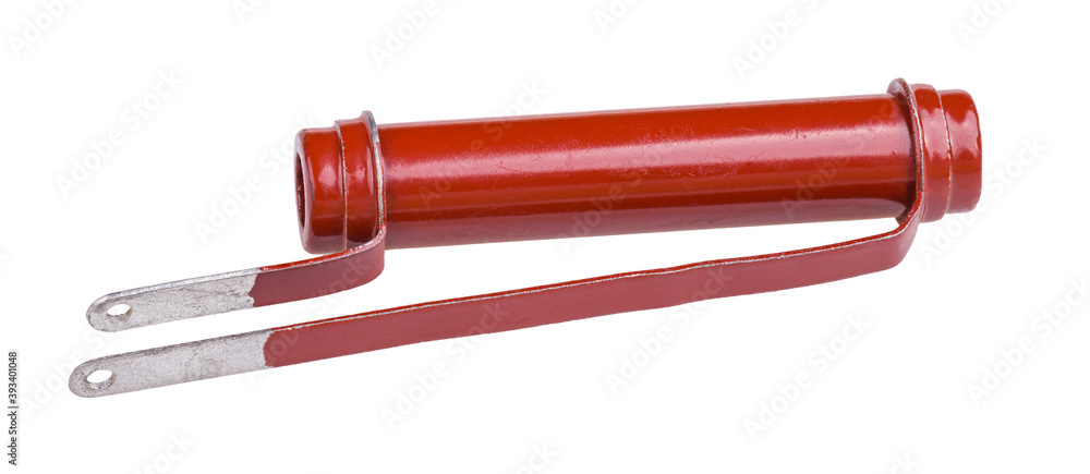 Single retro carbon power resistor isolated on a white background. Red cylindric resistive element with two bent metal contact terminals. One passive electrotechnical component. Electronics industry. Single retro carbon power resistor isolated on a white background. Red cylindric resistive element with two bent metal contact terminals. One passive electrotechnical component. Electronics industry.