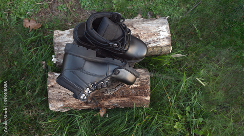 Pair of new boots black for foot, hard work or adventure travel. work boots.
