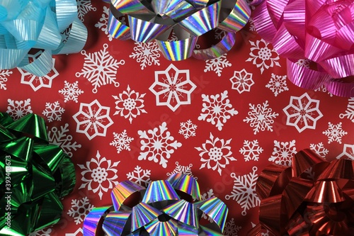 christmas snowflake bows red background