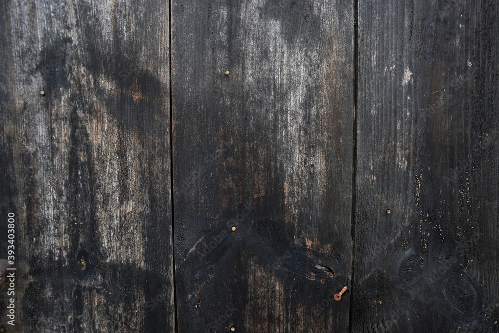 Naklejka premium Natural dark textured wooden background, vintage,ciemne stare drewno