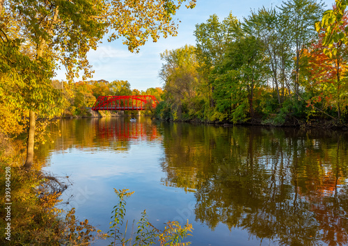Photography Early fall view of a red bridge