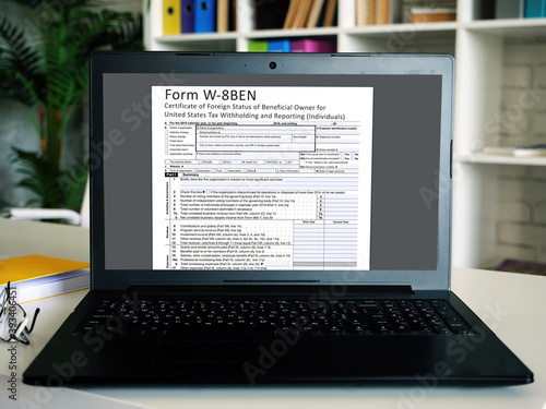 Business concept meaning  Form W-8BEN Certificate of Foreign Status of Beneficial Owner for United States Tax Withholding and Reporting (Individuals)  with inscription on the page.