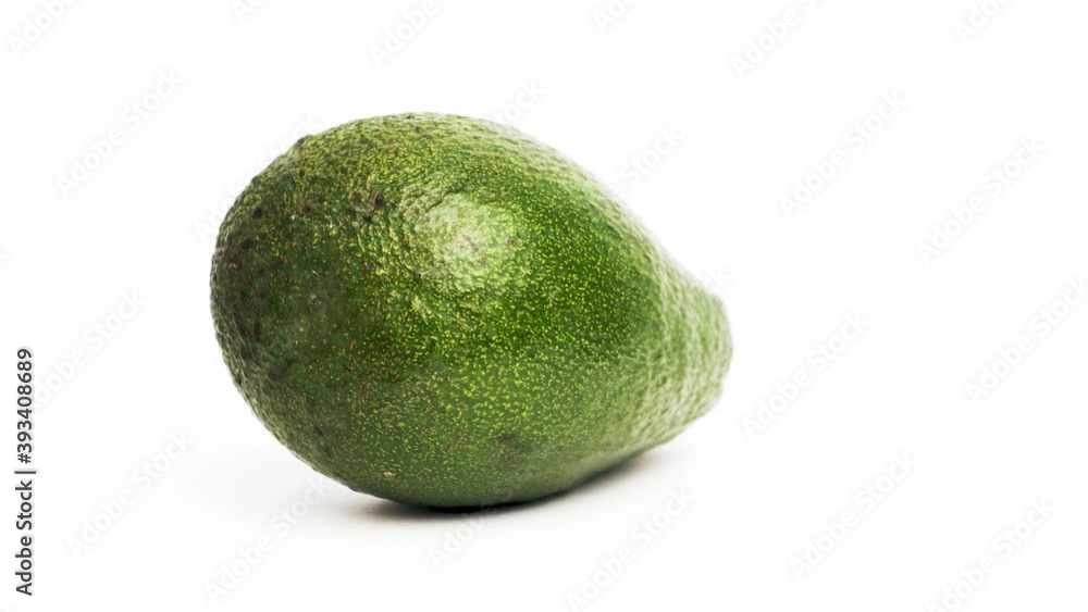 Fresh avocado spins in 360 degrees Fresh avocado spins in 360 degrees