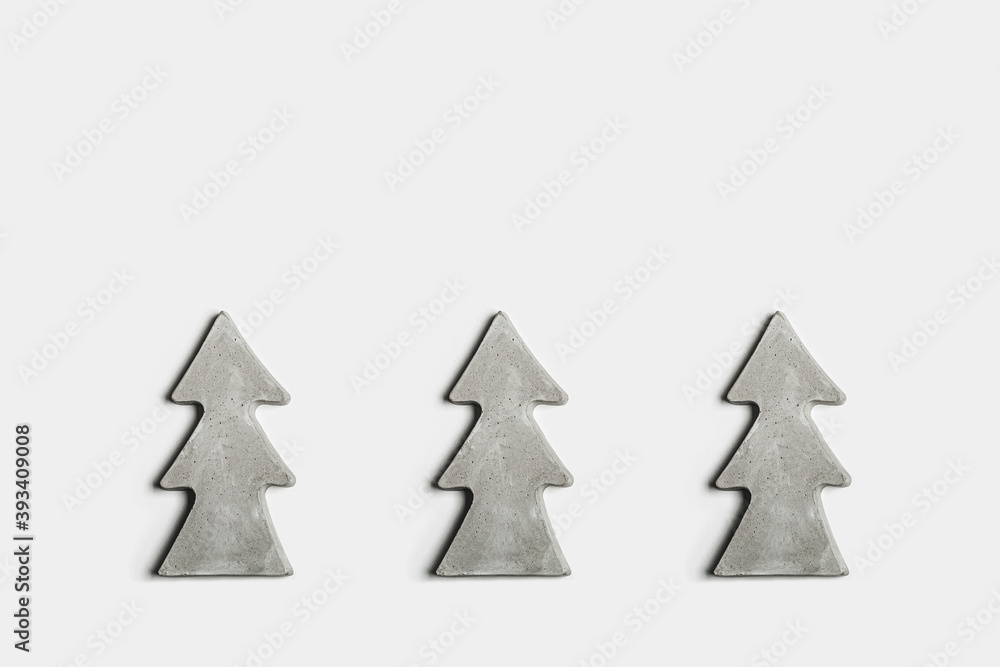 Hand made concrete christmas trees on white background Hand made concrete christmas trees on white background