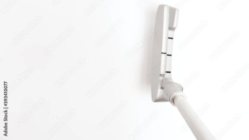 Hitting a Golf Ball on white background