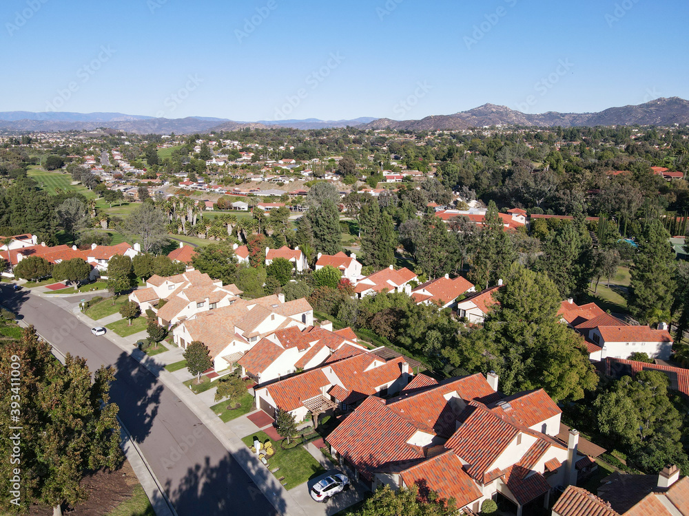 Aerial view of middle class neighborhood with residential house community in Rancho Bernardo during autumn season, South California, USA.