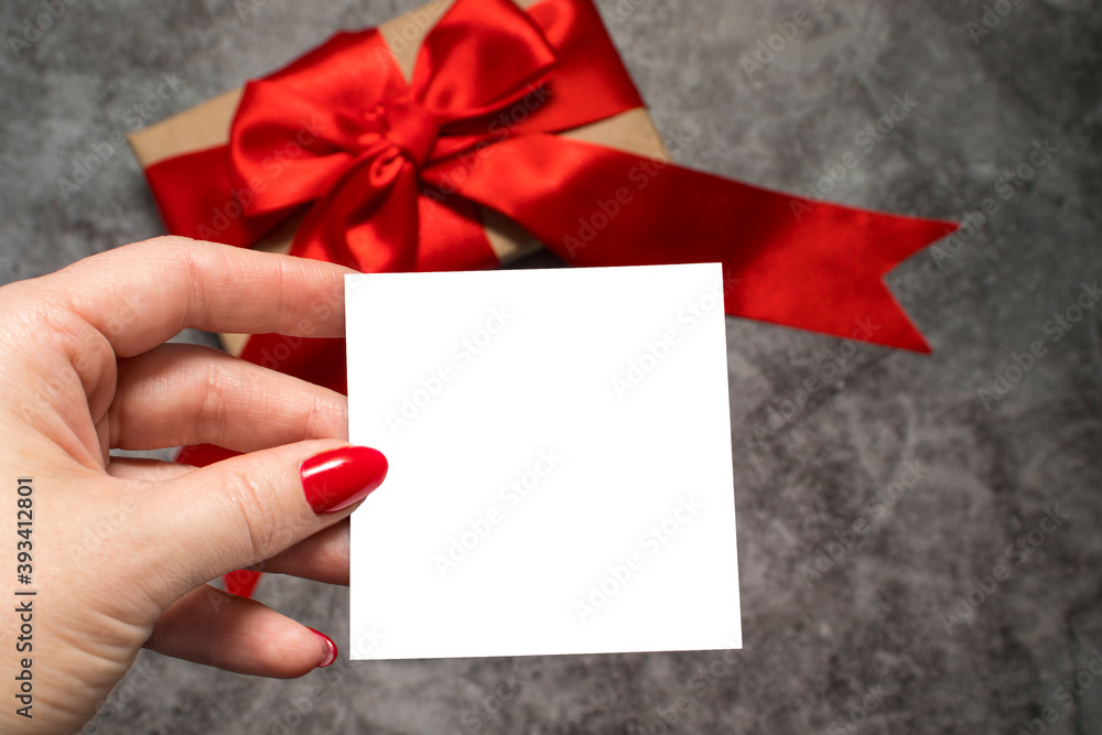 form in women's hands with space for text. concept greeting card for birthday, Valentine's Day or Christmas, mock up. copy space. form in women's hands with space for text. concept greeting card for birthday, Valentine's Day or Christmas, mock up. copy space.