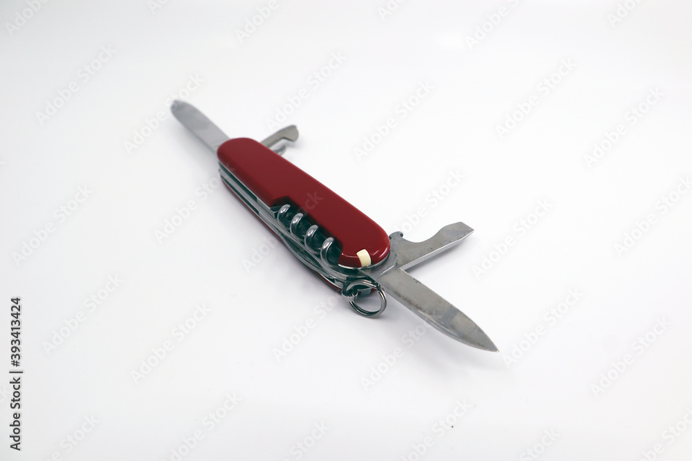 a red military knife for travel and outdoor use. a red military knife for travel and outdoor use.