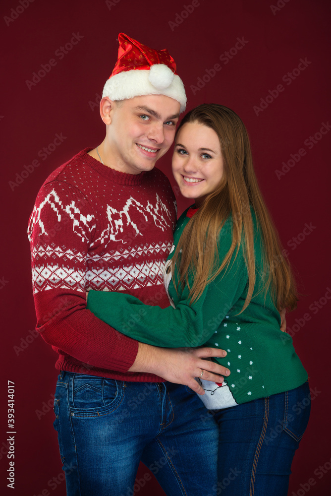 Fototapeta premium couple in christmas clothes