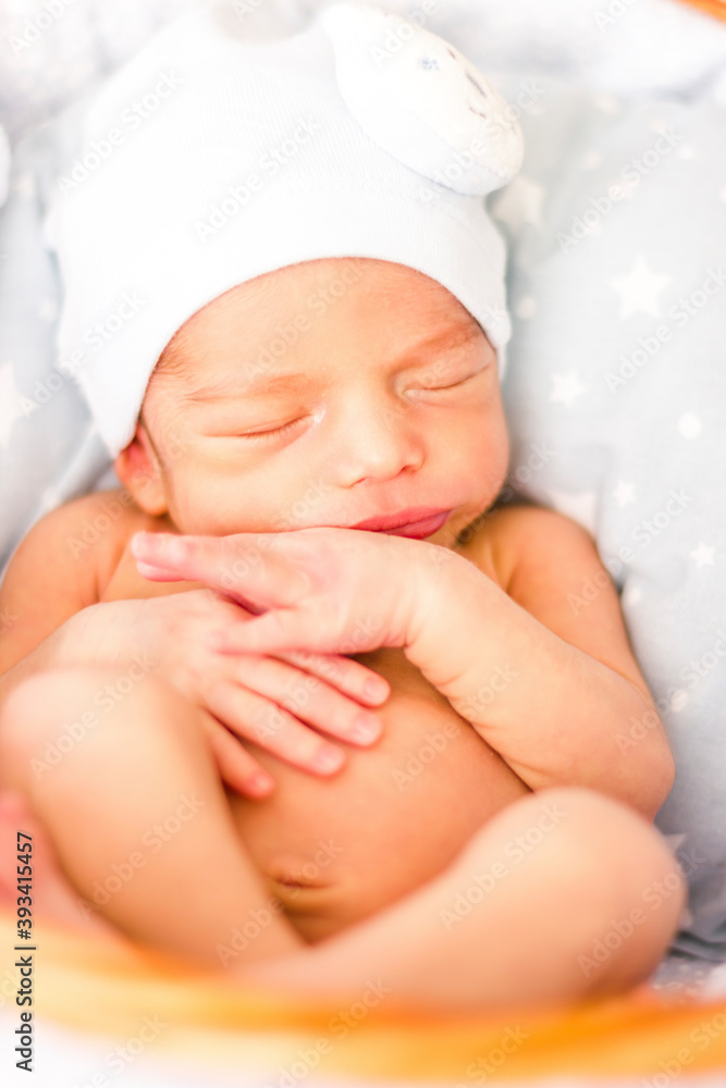 Sleeping newborn baby with funny hat. Baby face close-up. Sleeping newborn baby with funny hat. Baby face close-up.