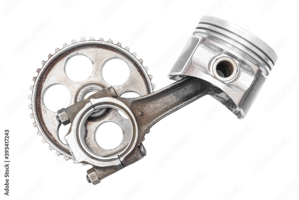 Car piston with connecting rod and gear wheel isolated on the white background. Car piston with connecting rod and gear wheel isolated on the white background.