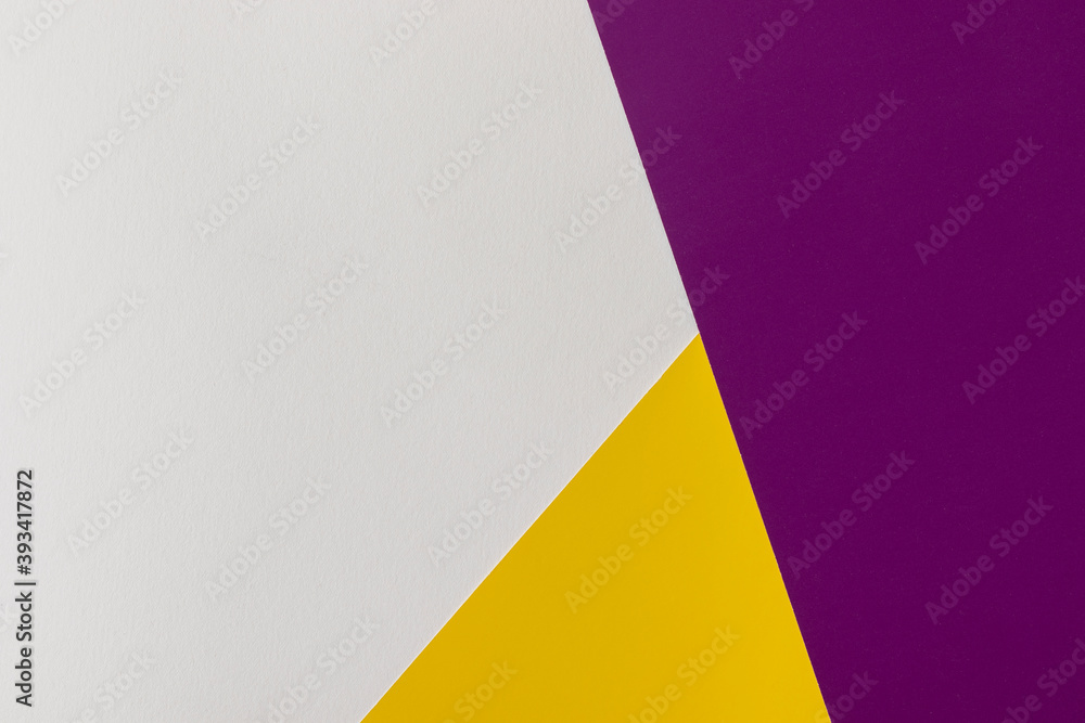 Abstract geometric paper background. White, yellow and purple colors. Abstract geometric paper background. White, yellow and purple colors.