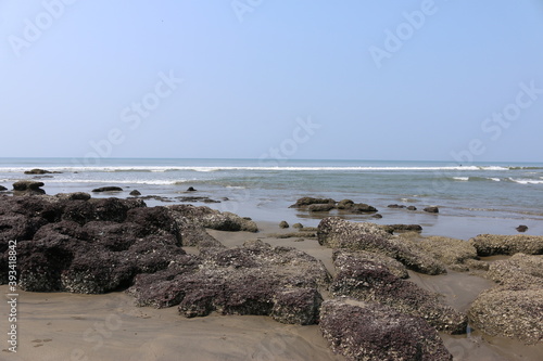 the stones on the seashore of Goa, India © subbot