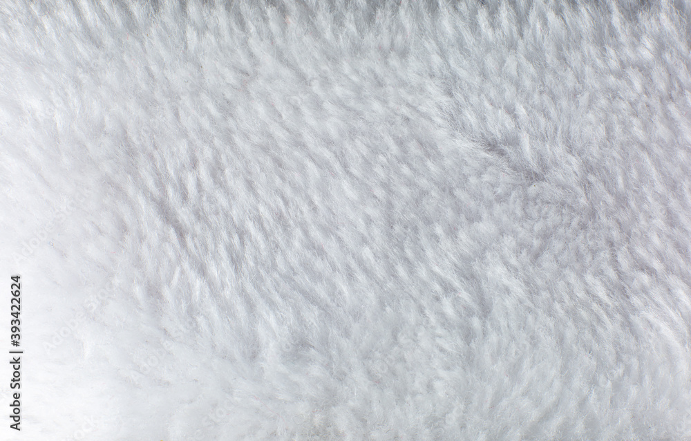 White cotton towel or carpet.fluffy texture background. Close up photo. White cotton towel or carpet.fluffy texture background. Close up photo.
