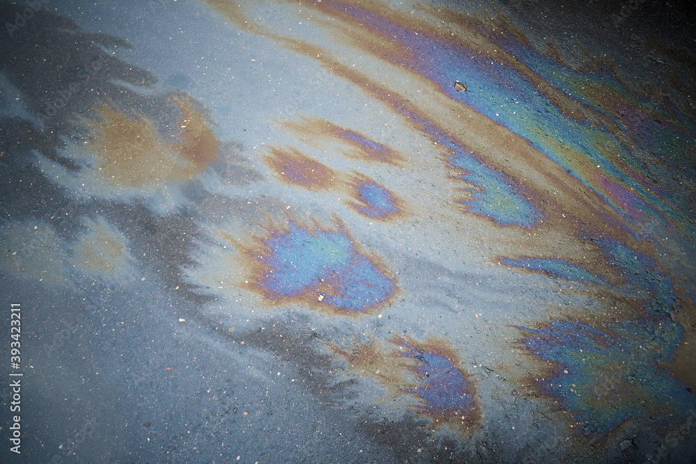Obraz premium Beautiful abstract colorful background, texture:, stains from engine oil on the asphalt