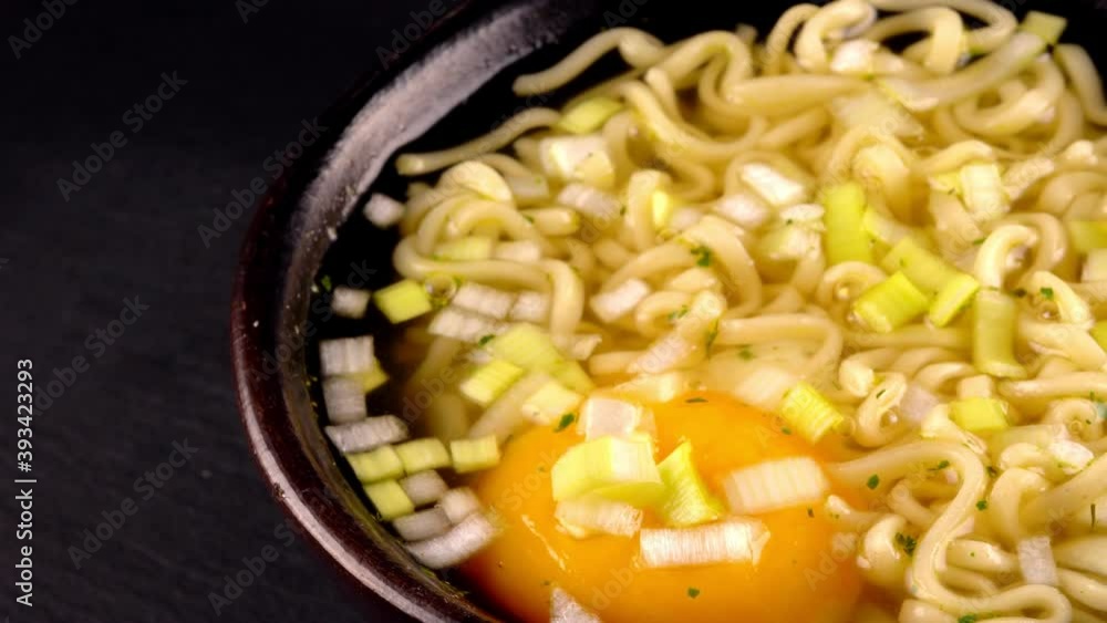 Noodle soup with egg and leek. Noodle soup with egg and leek.