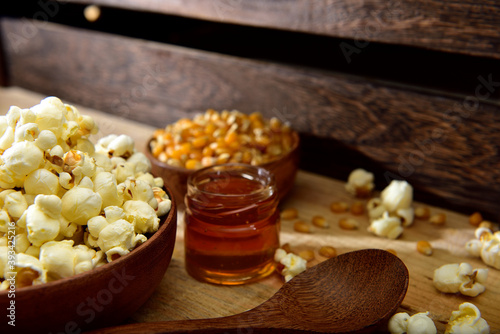Homemade fresh popcorn in a wooden bowl
