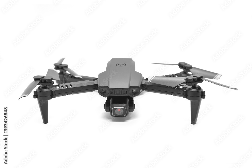 Closeup of black modern quadrocopter with camera isolated on white background. Flying drone. Technonolgy of unmanned flying.