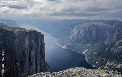 View over the fjord from the cliffs above Kjerag boulder, Norway