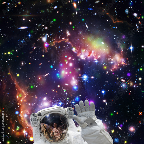 Astronaut and light. Science theme.  The elements of this image furnished by NASA.