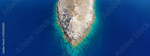 Aerial drone ultra wide photo of iconic lighthouse in Cape Tainaro or Matapan in southern part of Peloponnese and Europe, Mani peninsula, Greece photo