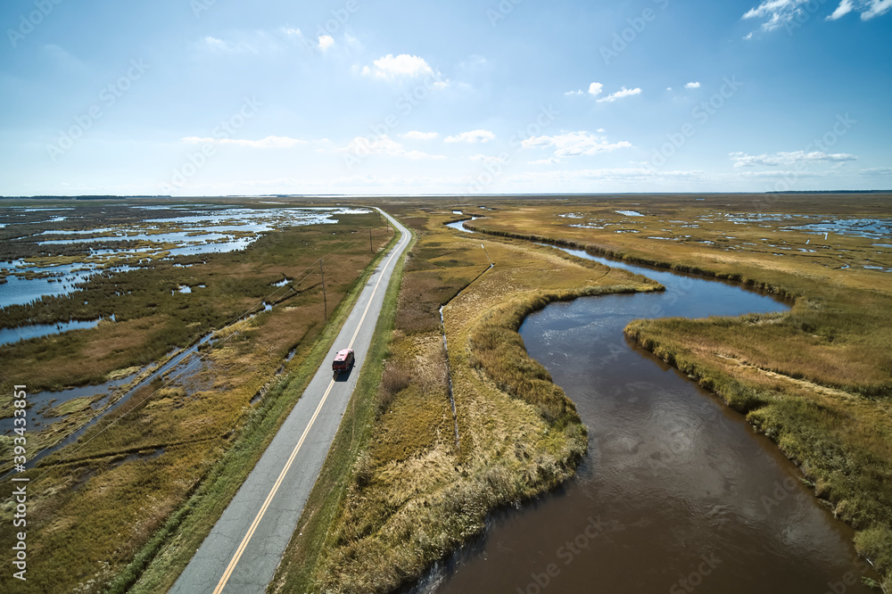 USA, Maryland, Drone view of road stretching across marshes along Nanticoke River on Eastern Shore USA, Maryland, Drone view of road stretching across marshes along Nanticoke River on Eastern Shore