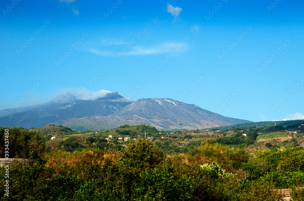 Fototapeta premium Etna is an active stratovolcano on the east coast of Sicily, close to Messina and Catania. It is the largest continuously active volcano in Europe
