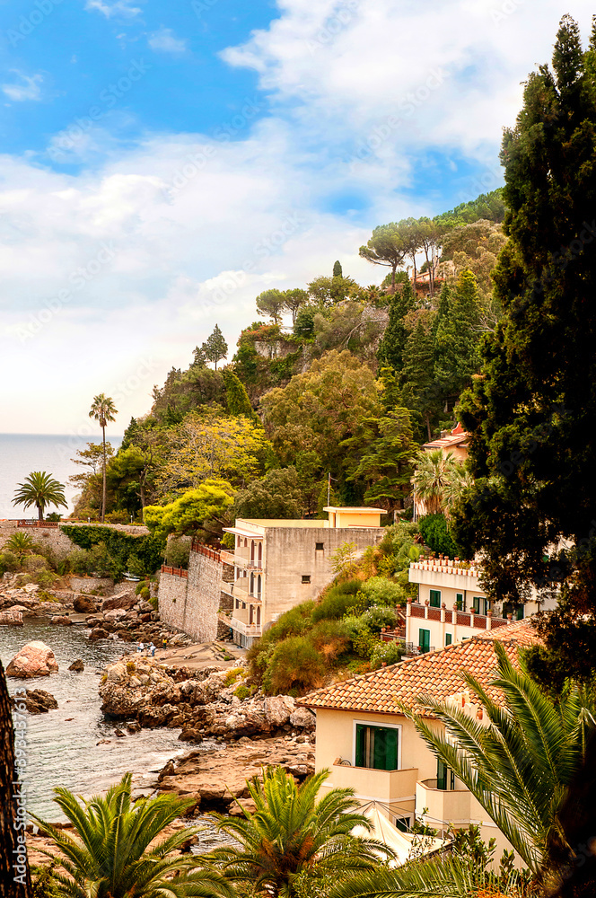 Taormina Mare is the coastal resort of Taormina high on its hilltop. It is a popular tourist resort with a sweeping bay. There is a frequent cable car service that takes people up and down to the sea