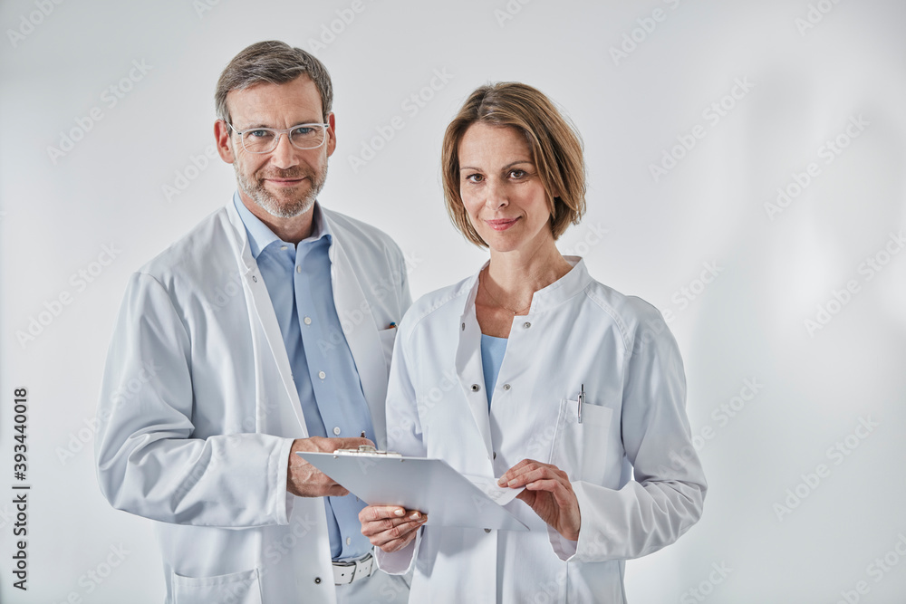 Portrait of doctors with anamnesis questionnaire Portrait of doctors with anamnesis questionnaire