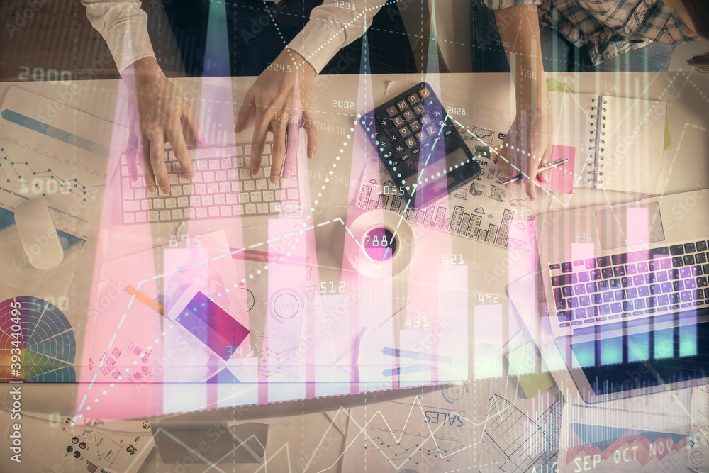 Double exposure of man and woman working together and financial chart hologram drawing. market analysis concept. Computer background. Top View. Double exposure of man and woman working together and financial chart hologram drawing. market analysis concept. Computer background. Top View.