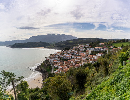 beautiful small village on the coast of Asturias nestled on a hillside