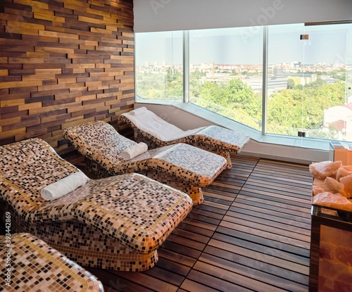 Interior of health spa with lounge chair photo